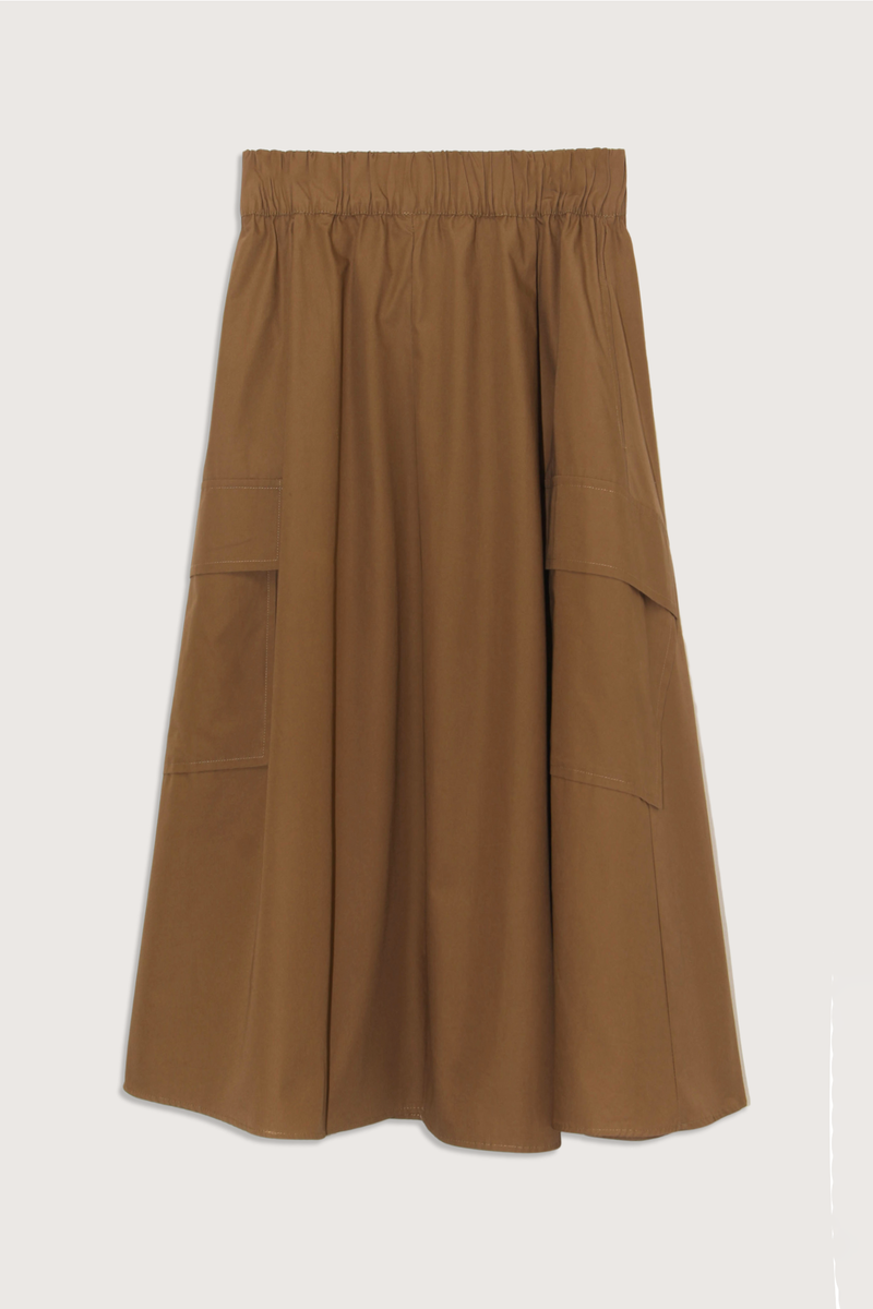 flat lay Le Cargo Full Flared Skirt Brown Sugar Oversized cargo pockets
On-seam pockets
Wide elastic waist
Tiny rolled hem
100% Japanese Cotton Poplin
Small Batch Made in Los Angeles