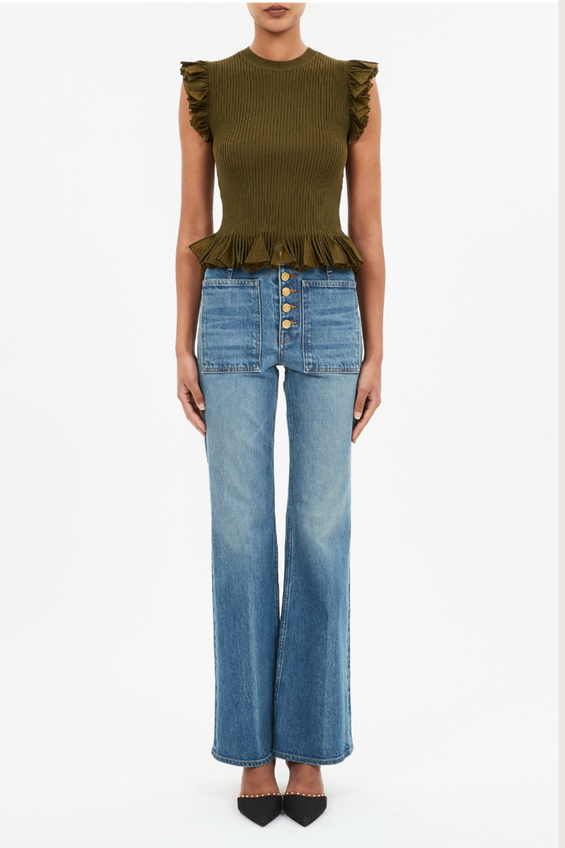 front profile model wearing Leila Top Olive Ruffled hem
Sunburst knit rendered in a lush green hue with shimmering lurex. slim fit
Crew neckline
Flutter sleeves