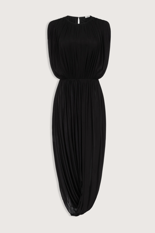 flat lay Leonora Draped Column Dress Black Fluid, lightweight crepe jersey dress
Intentional gathering at the waist for subtle shaping
Hook-n-eye closure in the back
88% cupro, 12% elastane