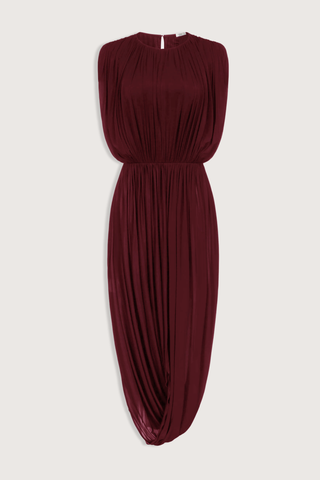 flat lay Leonora Draped Column Dress Bordeaux Fluid, lightweight crepe jersey dress
Intentional gathering at the waist for subtle shaping
Hook-n-eye closure in the back

88% cupro, 12% elastane