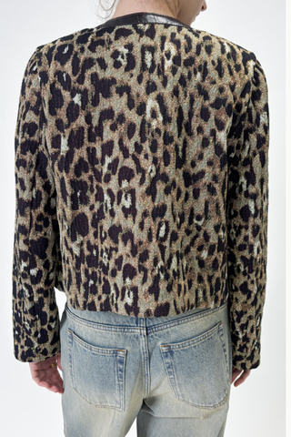 back profile model wearing  Leopard Jacket With Leather Trim & Pin brown and olive Collarless
Roundneck
Croc effect collar trim and front pockets
Long sleeve
Boxy cropped fit

Includes pink gemstone pin