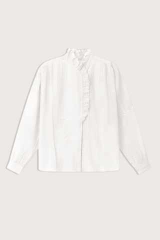 flat lay Leota Romantic Cotton Voile Embroidered Top White Embroidered cotton voile blouse
Relaxed fit
Front button closure
Asymmetric embroidered ruffled neckline
Front pleats
Wide sleeves with placement embroidery
Gathered button cuffs
Back gathers
Curved hem

100% Cotton