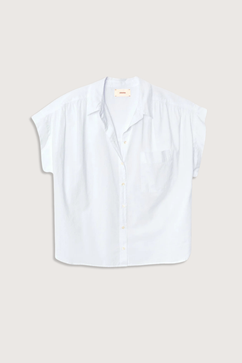 front flat lay Lexi Short Sleeve Shirt Skylight blue cotton Button-front shirt
Left chest pocket
Cap sleeves
Softly shirred shoulders
Back yoke finished
Button-tab detail