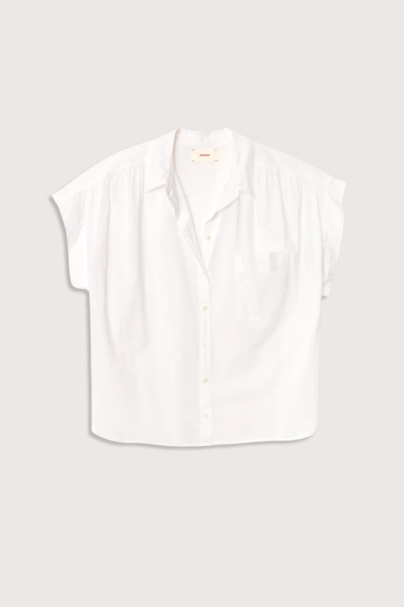 front flat lay Lexi Short Sleeve Shirt White cotton Button-front shirt
Left chest pocket
Cap sleeves
Softly shirred shoulders
Back yoke finished
Button-tab detail