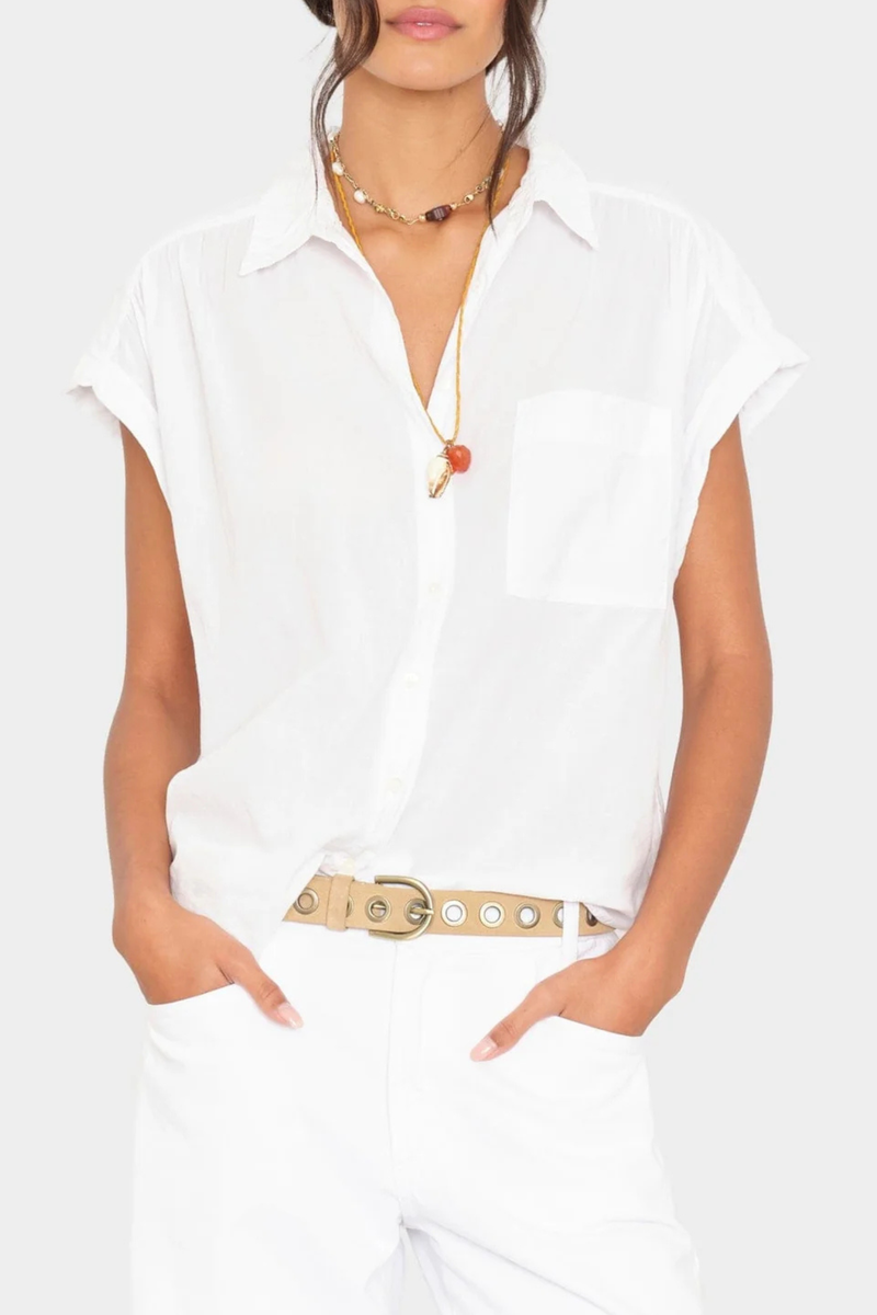 front profile model wearing Lexi Short Sleeve Shirt White cotton Button-front shirt
Left chest pocket
Cap sleeves
Softly shirred shoulders
Back yoke finished
Button-tab detail