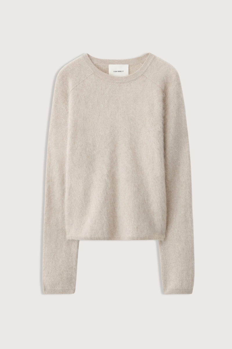 flat lay Lexia Brushed Crew Sweater sand Brushed cashmere
Relaxed fit
Cropped silhouette
Round neck
Accentuated seams at the front
Full-length raglan sleeves
Ribbed trims
100% Cashmere