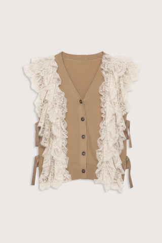 flat lay Lisette Solid Sweater Vest khaki Lace Detail
V-neckline
Button front closure
Wool lace combo
Cap sleeve
Tie detail on the side
Self: 100% Wool | Decoration: 100% Polyamide