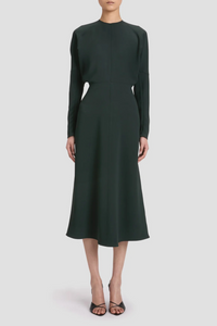 front profile model wearing Long Sleeve Dolman Midi Dress dark pine