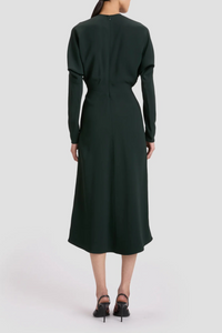 back profile model wearing Long Sleeve Dolman Midi Dress dark pine