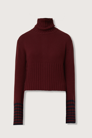 flat lay Long Sleeve T-neck Button Back Sweater, burgundy wool, Turtleneck
Button back detail, Covered buttons, Horizontal stripe detail on cuff, Thick ribbed hem and cuff, Shrunken cropped fit