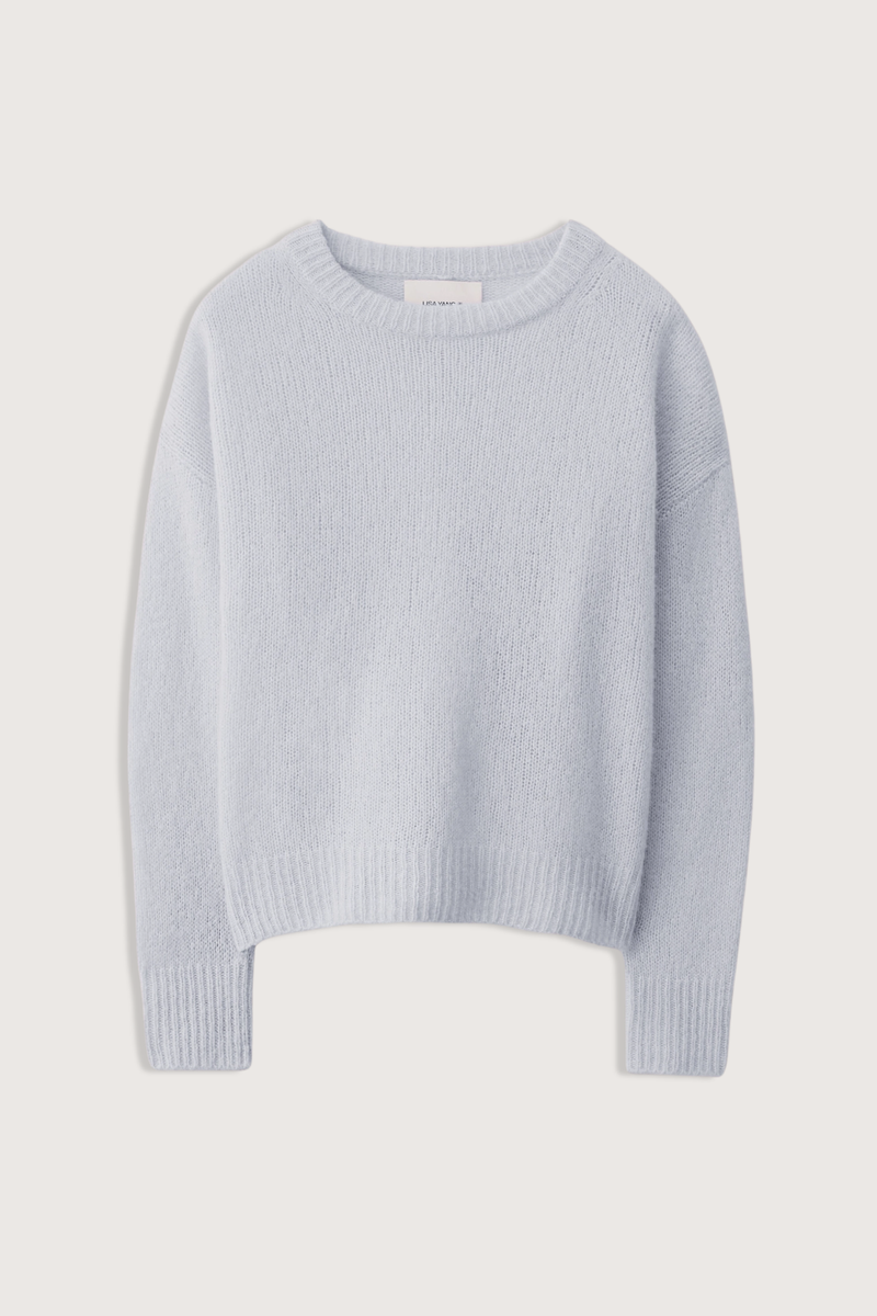 flat lay Lova Cashmere/Silk Sweater Sea Breeze light blue Featherlight silk cashmere composition
Relaxed silhouette
Ribbed round neck
Dropped shoulders
Full-length sleeves
77% Cashmere, 23% Silk