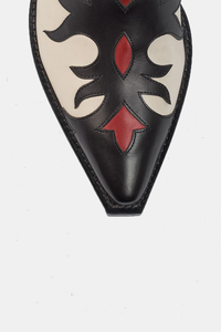 close up of toe area Lower Heel Western Boots with red contrast and pull tab flame cutouts and bevelled heel 