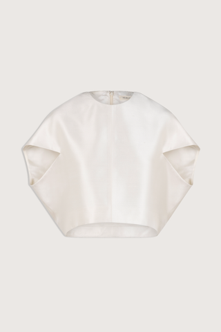 flat lay Lulu Silk Shantung Top ivory Crew neck top
Forward facing petal sleeves
Italian silk shantung fabric
Cropped silhouette
High-low hem
Center back invisible zipper for closure
Silk lining