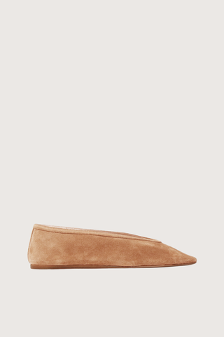 side profile Luna Suede Slipper sienna Handcrafted in suede
Cushioned calf leather insole
Suede piping
8mm heel
Made in Italy