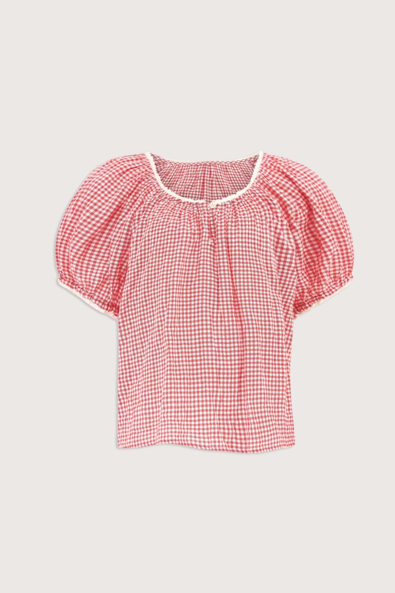 flat lay Maisie Gingham Top cherry red Balboa Gingham Mini Check
Added stretch
Relaxed peasant blouse
Notched scoop neck
Single-button detail
&nbsp;Puff sleeves
Contrast trim
98% Cotton, 2% Spandex