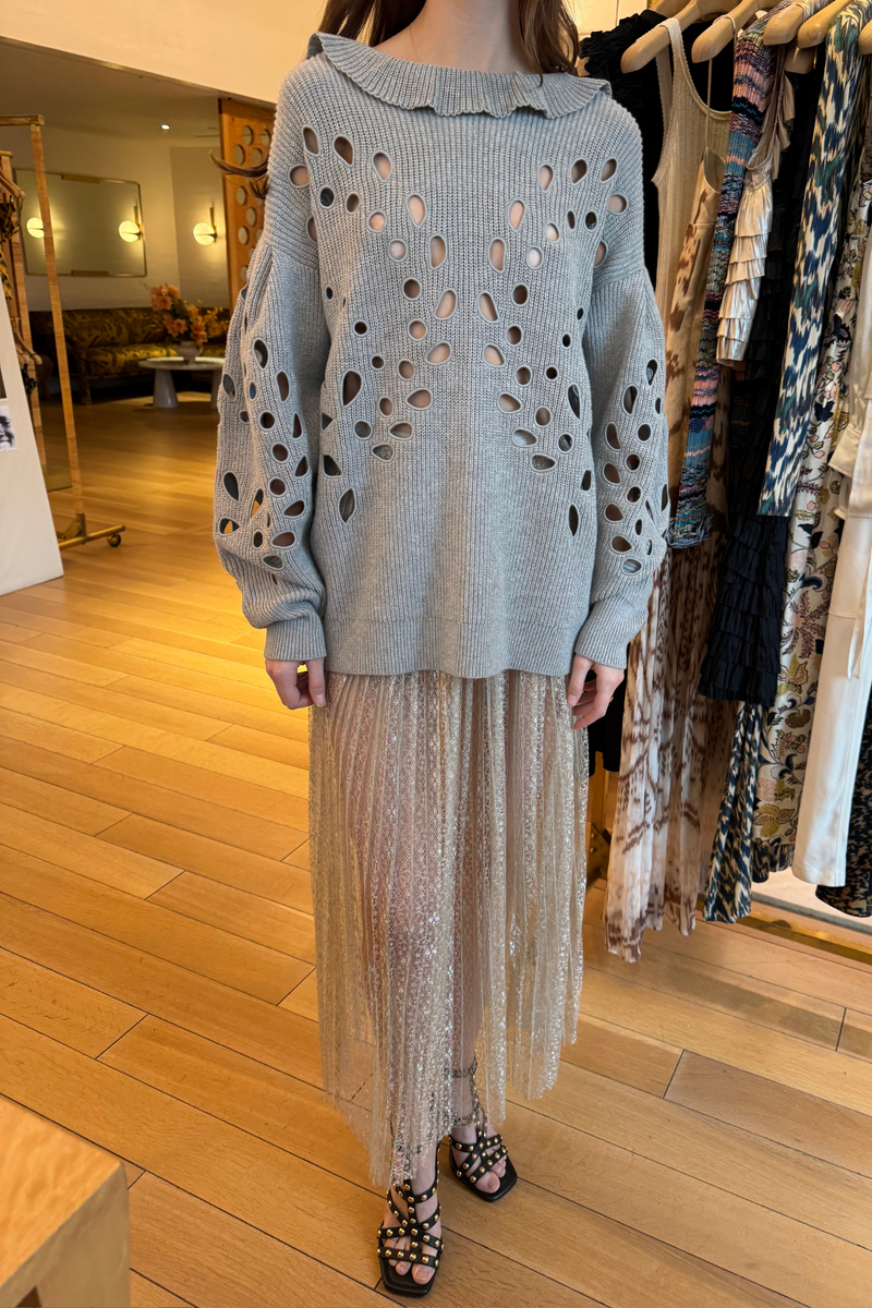 front profile model wearing Maren Pleated Soft Metallic midi Skirt sterling silver