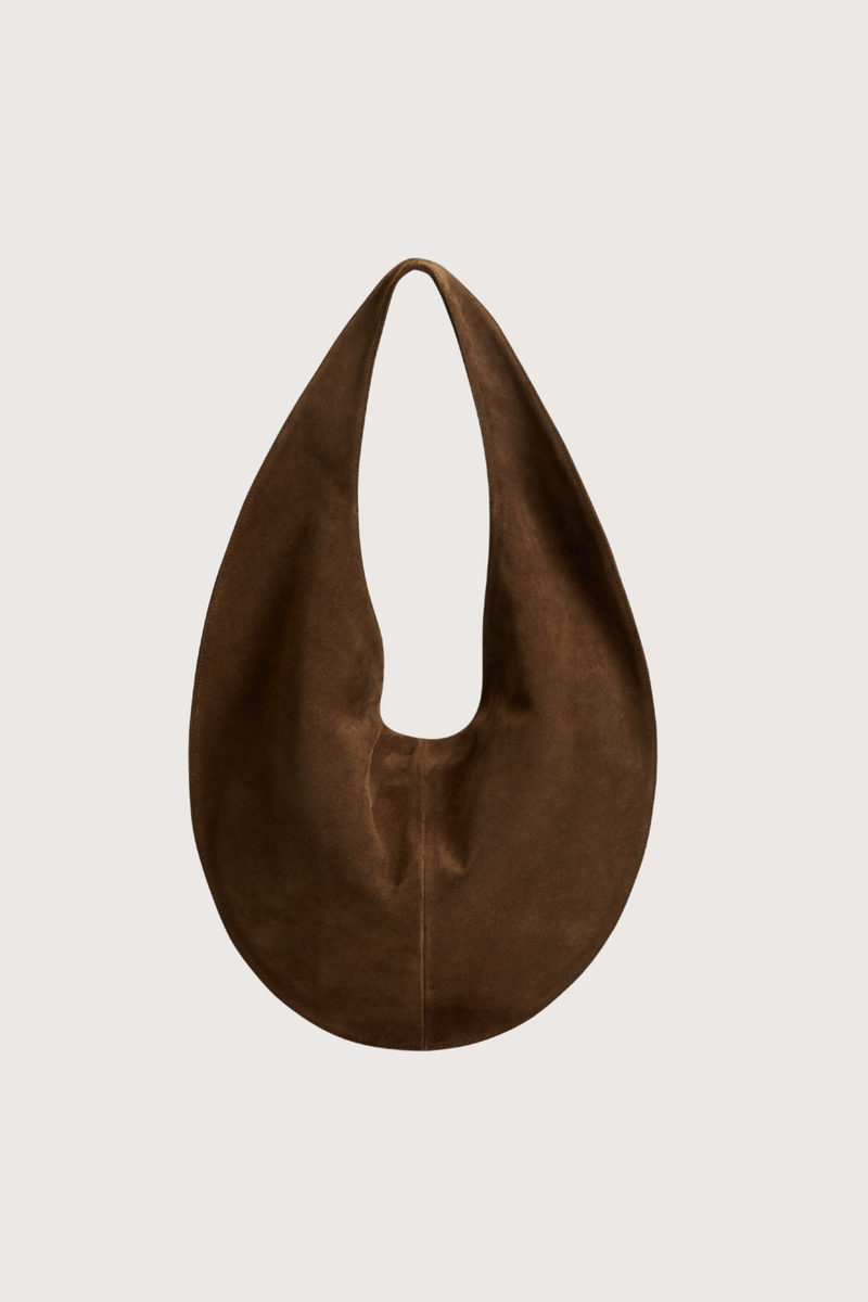 flat lay Market Tote Suede Bag suede rider chocolate brown Shoulder style
Magnetic closure
One internal zip pocket
Internal slide-in phone pocket
Smooth suede exterior
Round shape
Tapered straps
100% Calfskin Suede