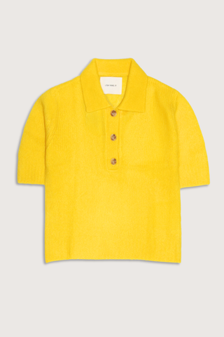 flat lay Masy Polo Cashmere/Silk Top Polo shirt
Textured silk cashmere
Regular fit
Slightly cropped silhouette
Neat polo shirt neckline with buttons
Short sleeves
Ribbed trims