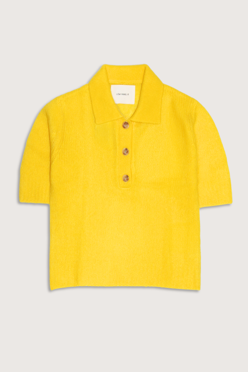 flat lay Masy Polo Cashmere/Silk Top Polo shirt
Textured silk cashmere
Regular fit
Slightly cropped silhouette
Neat polo shirt neckline with buttons
Short sleeves
Ribbed trims