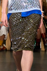front profile model wearing Matteo Pailette Skirt olive Pointelle knit
Pencil skirt style
Sequin embroidery throughout
High waist
Skirt falls straight from hip to hem
Hem falls below the knee
Ribbed hem
Pull-on style
Merino wool/cashmere