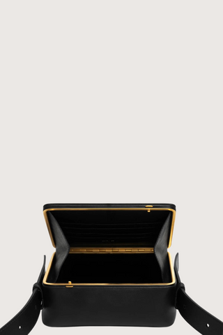 opened view of Maya cooper black Bag smooth leather exterior back pocket adjustable strap structured square shape with Stainless steel frame is 24k gold-plated and seven interior card slots