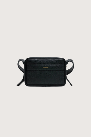 front profile Maya Brandon Black Bag pebbled leather exterior back pocket adjustable strap structured square shape