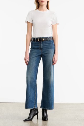 front profile model wearing Megan Jean Classic Wash mid blue Mid-rise
Wide leg jean cotton
Japanese stretch denim
Fitted through waist and hips
Cropped ankle length
Opens to a relaxed leg
No front pockets
No outer side seam
Back patch pockets
Back darts
Zip fly