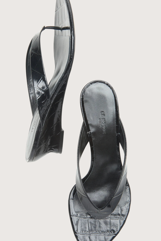 top profile Micro Thong Wedge Sandal Black Micro Wedge Thong
Coco black croc embossed leather
Cushioned calf leather insole
40mm heel