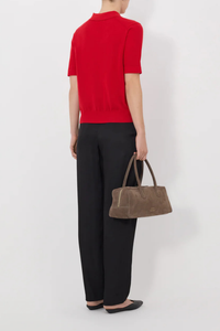 back profile model wearing Migo Cashmere Polo Red Fluid, fine knit cashmere
Straight fit
Spread collar
Small button placket
Ribbed details