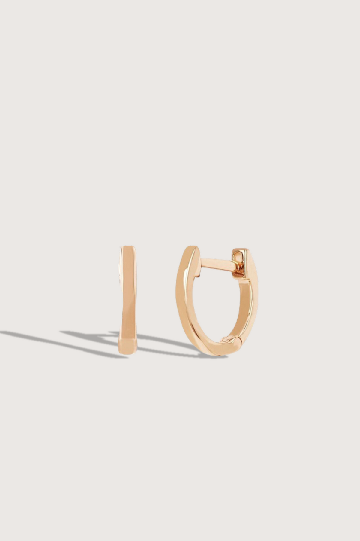 flat lay Mini Huggie Earring Rose Gold (Single) 14k gold