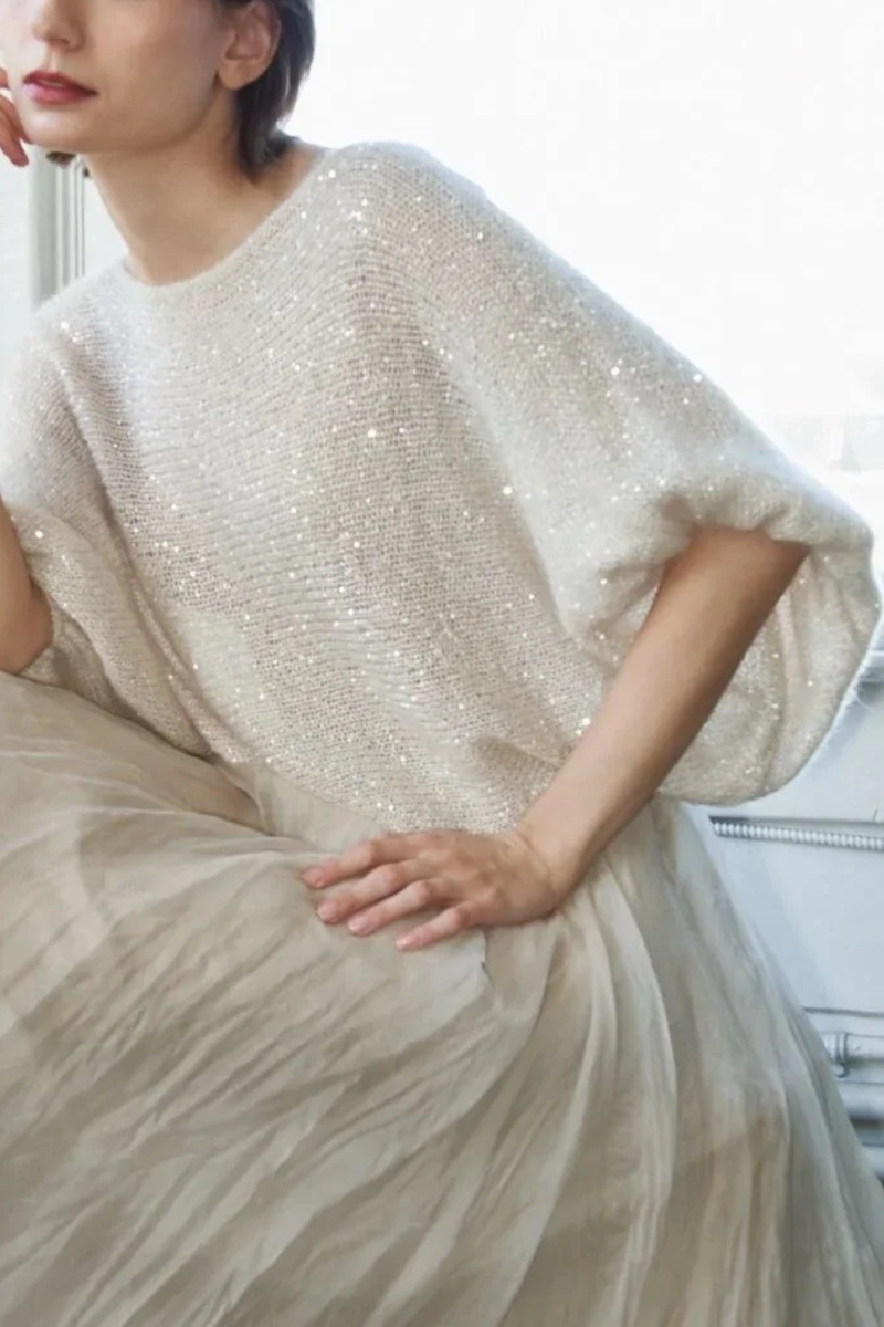 front profile model wearing Mohair Silk With Sequins Top ivory Mohair silk blend
Sparkle Top
Lightweight
Half-sleeve
Airy feel
Subtle shimmer throughout
Boat neckline
Continuous sleeves
Loose boxy shape
Cropped length
Relaxed proportion