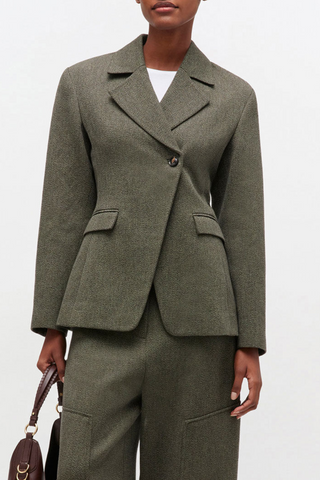 front profile model wearing Mouline Blazer forest green Collar and lapels Button closure 2 pockets Inner counter button