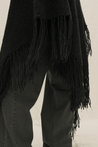 close up fringe detail for Myles Shawl With Fringe charcoal grey Hand knitted
Italian cashmere blend yarn
Oversized
Long hand knotted fringe
Designed to be wrapped
Italian Yarn