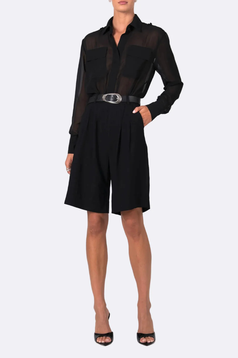 front profile model wearing Nadine Bodysuit black Bodysuit
Sheer
Long-sleeve
Button-up silhouette
Satin chest pockets