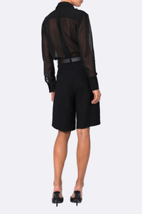 back profile model wearing Nadine Bodysuit black Bodysuit
Sheer
Long-sleeve
Button-up silhouette
Satin chest pockets