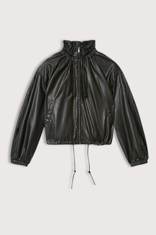flat lay Neela Fluid Faux Leather Jacket black Short supple faux leather jacket
Collar with tie-up drawstrings
Long sleeves
Zip-up front
Side pockets
Tapered elasticated cuffs
Tapered drawstring hem
Relaxed fit