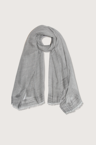 flat lay New Leonor Scarf grey melange fringe edge