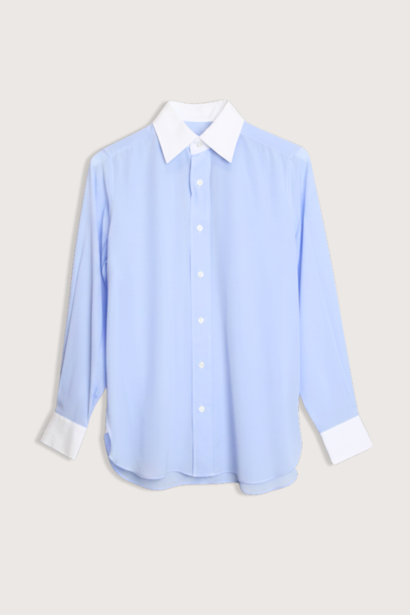 flat lay New Work Shirt pale blue Square collar
Curved cuffs
Hem gussets
Side seams
Curved hem
Straight cut - classic fit
Mother-of-pearl buttons
Light weight fabric
100% silk