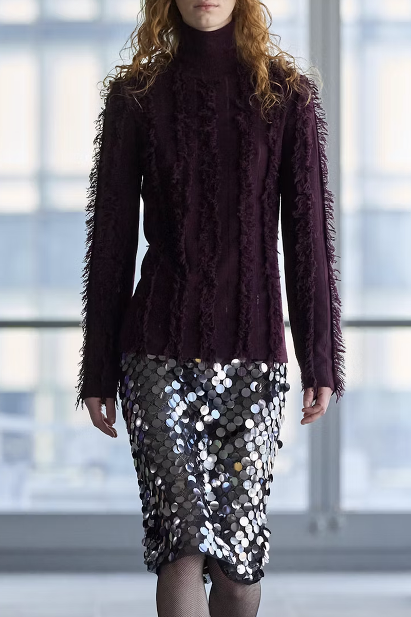 model wearing  Nico Shredded Intarsia Turtleneck burgundy long sleeve wool