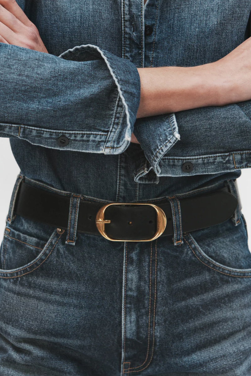 model wearing Nili Belt leather Black with brass buckle