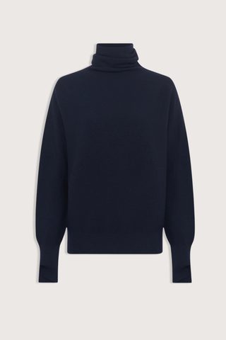 flat lay Nora Oversized High Neck Knit Top Night blue High neckline
Drapes loosely around the neck
Loose fit
Long sleeves
Garter-stitch knit sweater
Wide slit cuffs
Seamless
100% pure extra-soft virgin wool