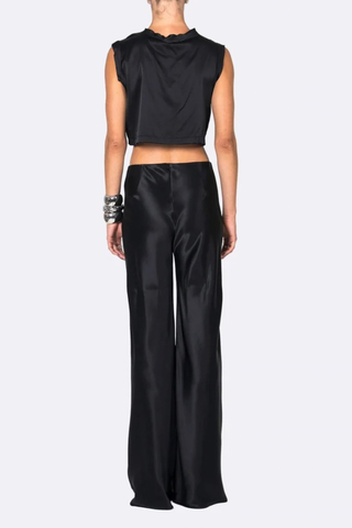 back profile model wearing Norma Satin Pant black Mid rise
Straight-leg
Seamless
Drapes beautifully
Elastic waist
77% Acetate, 23% Polyester