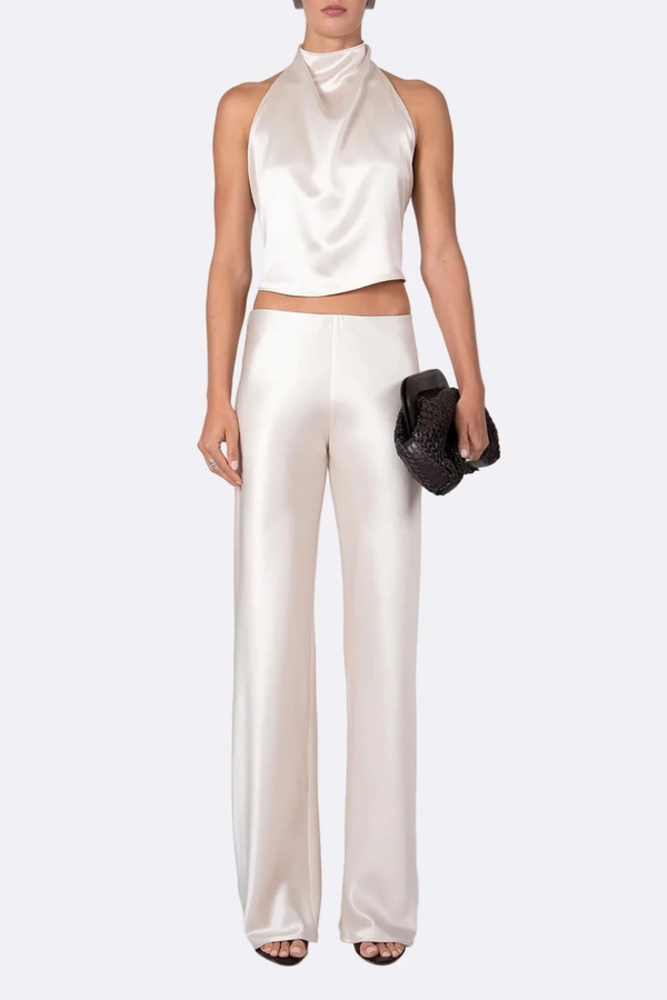 front profile model wearing Norma Satin Pant Champaign Mid rise
Straight-leg
Seamless
Drapes beautifully
Elastic waist
77% Acetate, 23% Polyester