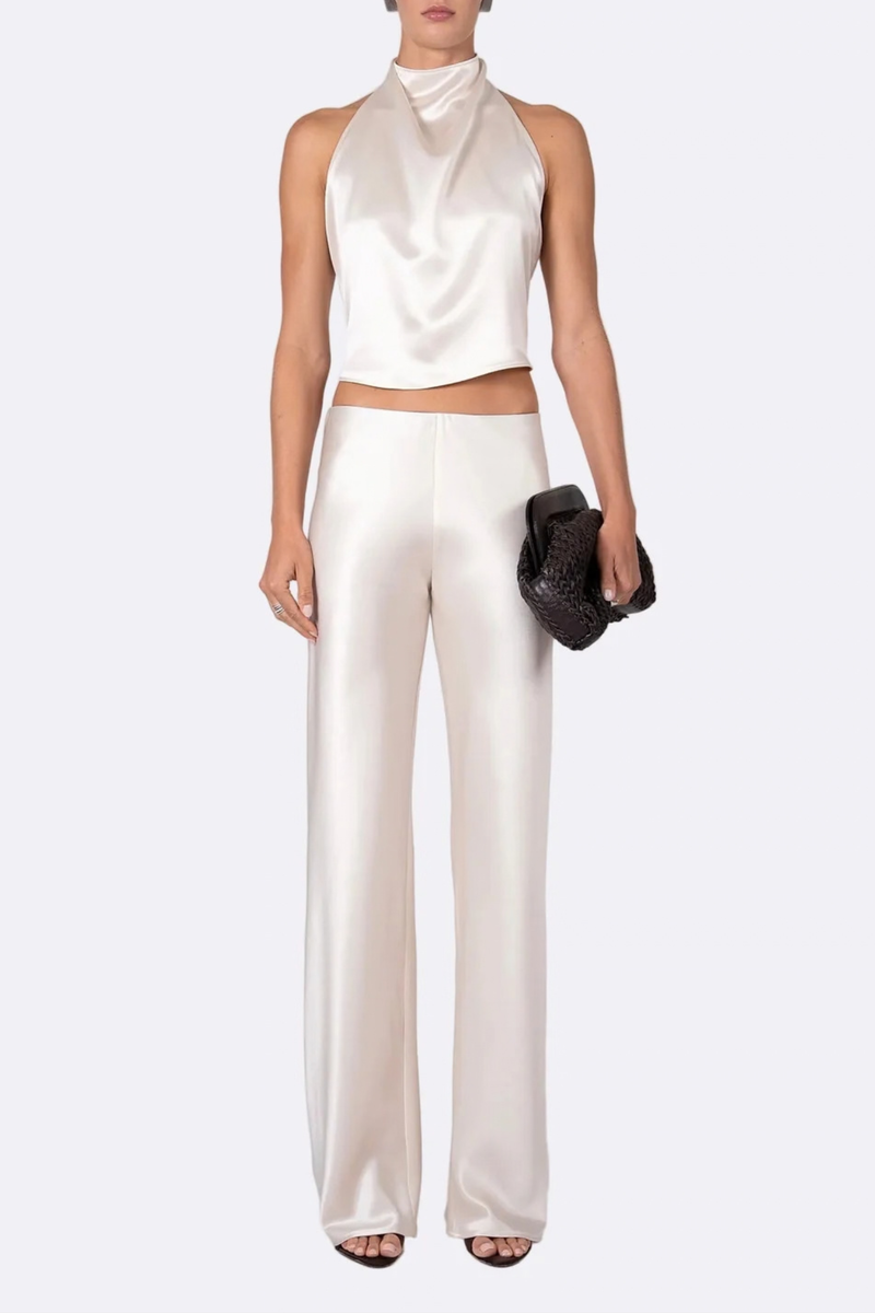 front profile model wearing Norma Satin Pant Champaign Mid rise
Straight-leg
Seamless
Drapes beautifully
Elastic waist
77% Acetate, 23% Polyester