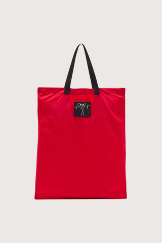 flat lay front profile Nylon Bag red with black strap and logo patch Foldable nylon tote