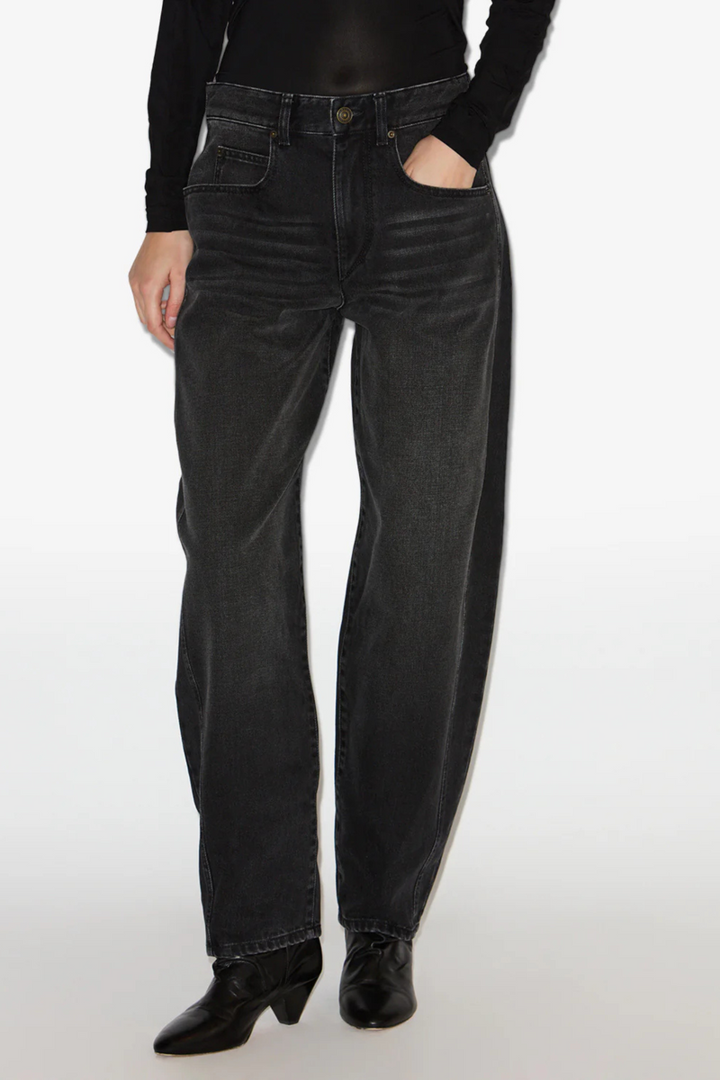 front profile model wearing Oriane Wide Denim Pant faded black barrel fit