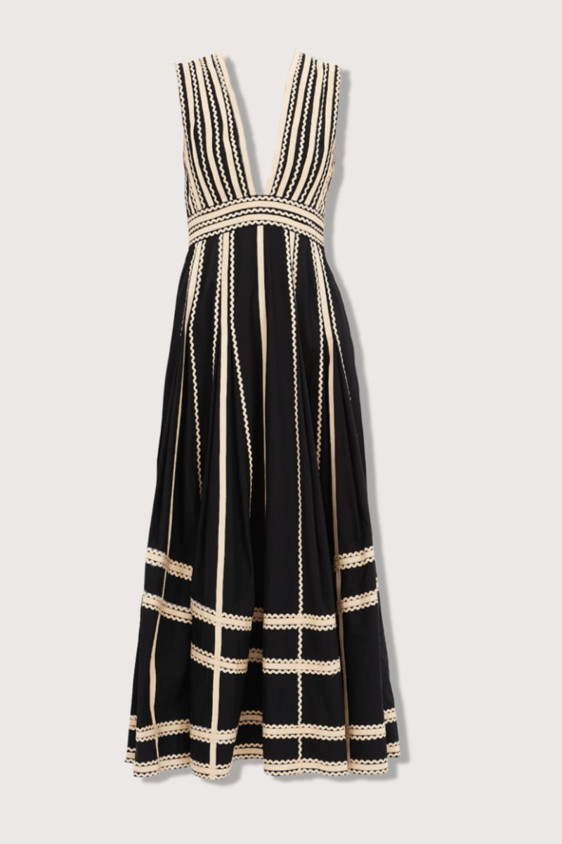 flat lay Palermo Deep V Midi Dress Ric-rac and grosgrain ribbons
Black silhouette
Plunging neckline
Full, gathered hem
Water-washed cotton poplin
Midi length
Sleeveless