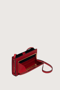 side profile open view Parker Brandon Horizon leather bag Short Strap red Strap length is adjustable
Outside pocket in signature frame construction with single latch closure. gold logo embossed in back