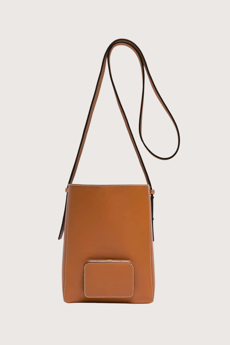 front profile Parker M Soft Long Strap leather Tan bag with adjustable strap and exterior pocket