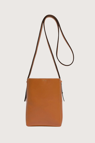 back profile Parker M Soft Long Strap leather Tan bag with adjustable strap and exterior pocket